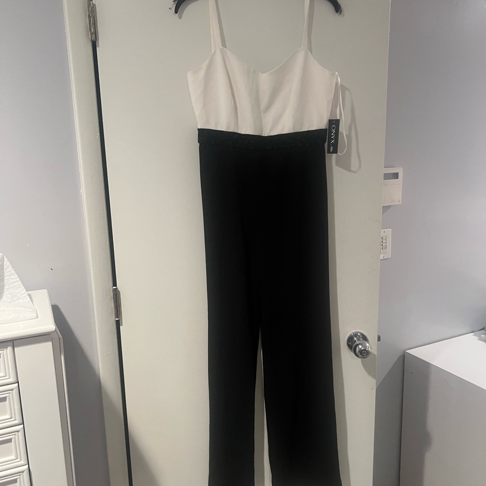 Onyx Nite Black and White Spaghetti Strap Jumpsuit size 4